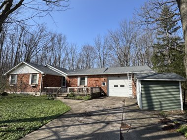 A Western New York brick home with a new roof by TNE