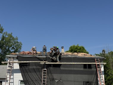 Completed home with new roof, siding and gutters