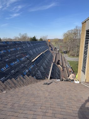Full roof replacement with dark architectural shingles