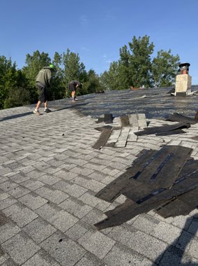 Storm damage roof work in progress in Western New York