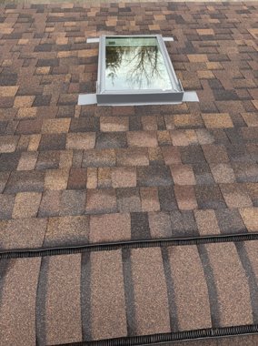 Siding and trim around the window line &mdash; TNE Roofing & Siding
